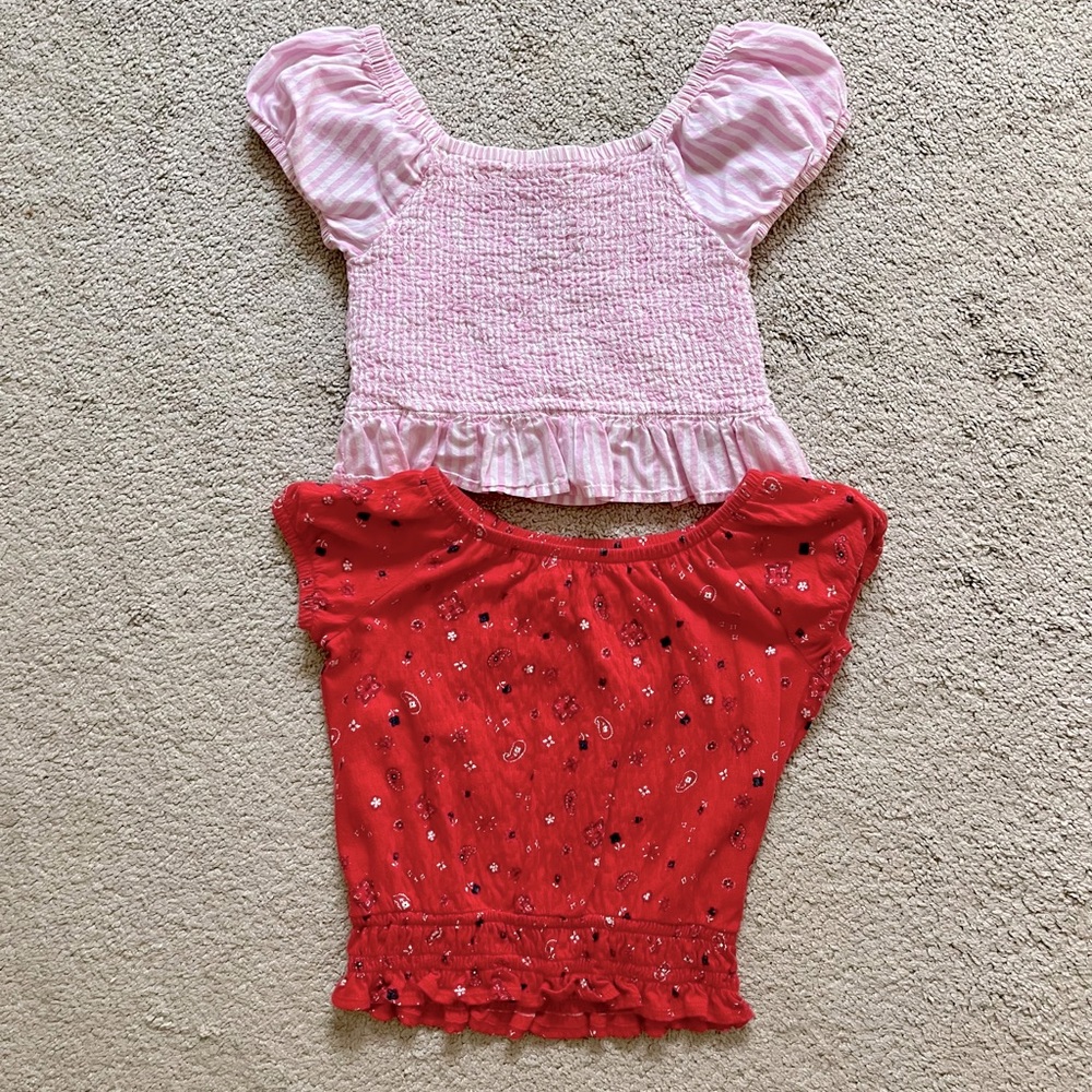 Two girl’s cropped shirts